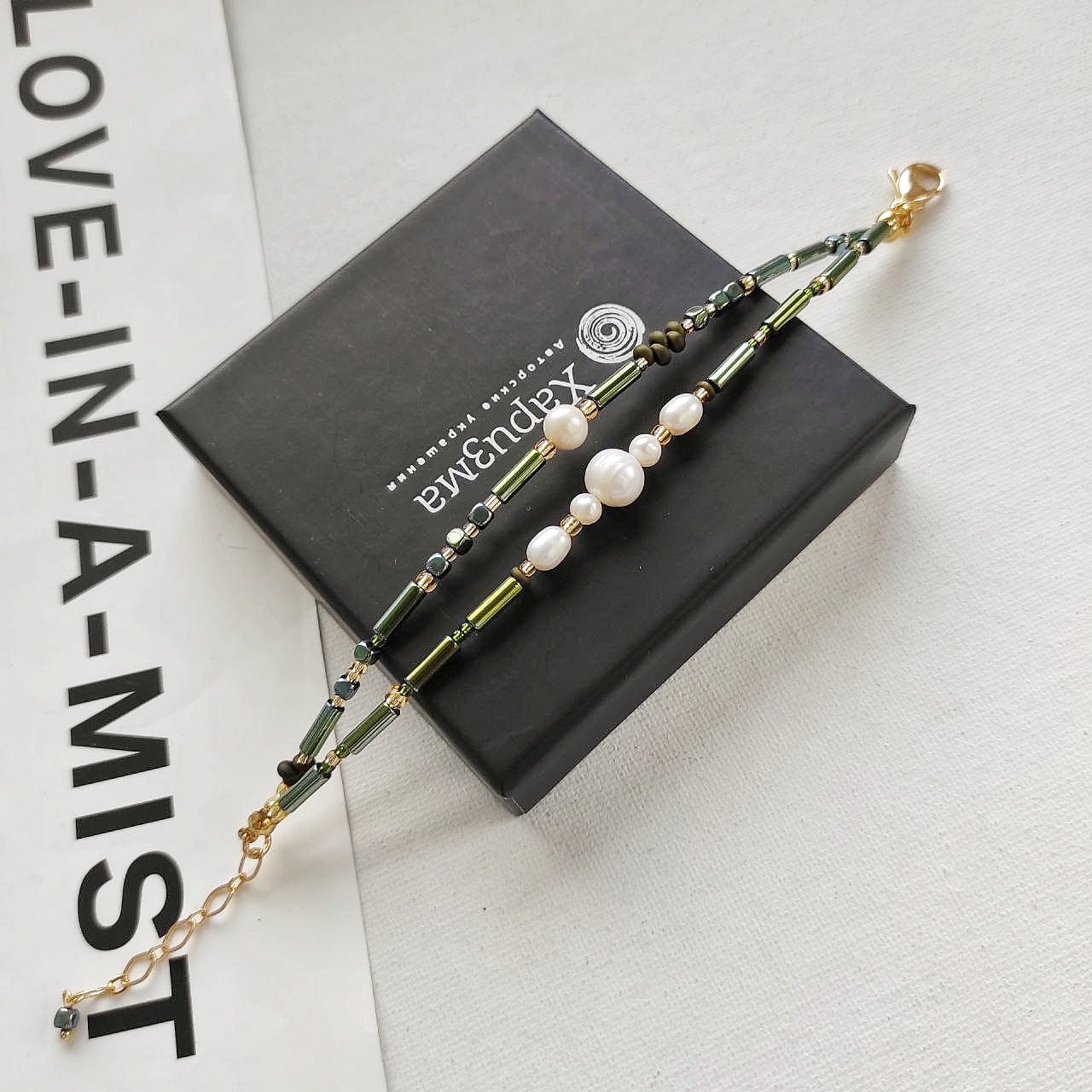 Браслет из жемчуга и гематита зелёные оттенки