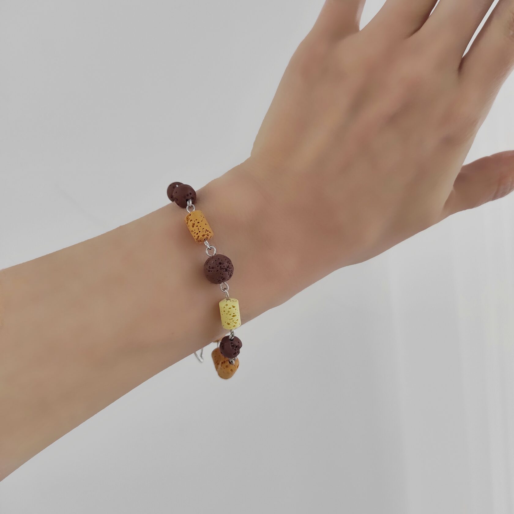 Браслет из вулканита: оранжевый + жёлтый + шоколадный оттенки