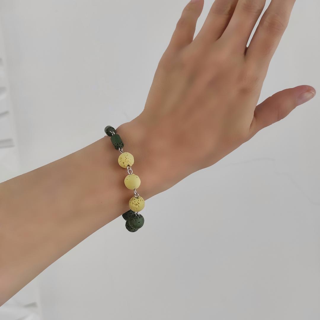 Браслет из вулканита темно-зелёные + оранжевые оттенки