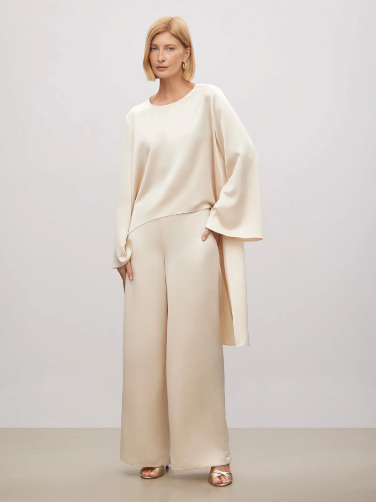 Блуза из тенсела ,
80% полиэстер, 20% вискоза ,