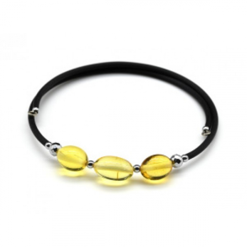 Стильный женский браслет с янтарем на каучуке овал 8*10мм цвет лимонный, 17см