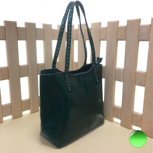 Вместительная сумка Aerostat формата А4 из качественной натуральной кожи цвета зеленый опал.