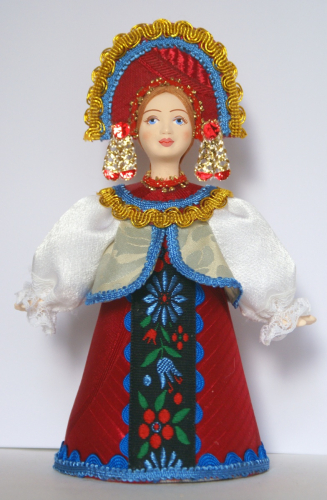 Кукла сувенирная фарфоровая. Девушка в праздничной одежде.