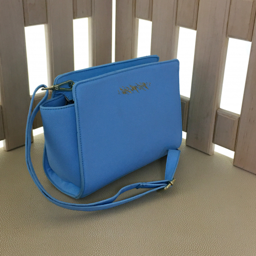 См. описание. Стильная сумка Utu из прочной эко-кожи небесно-голубого цвета.