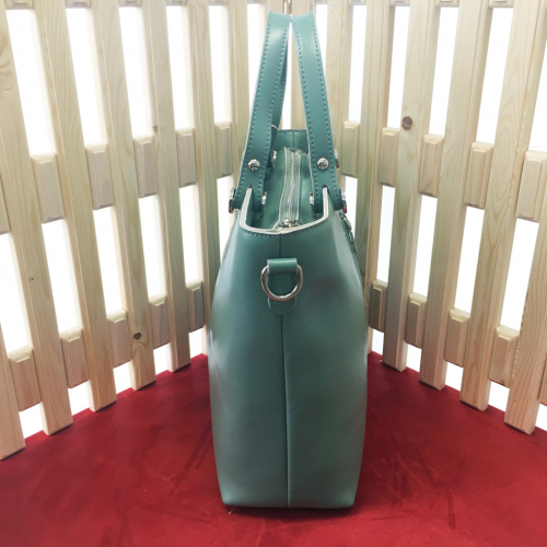 Классическая сумка Storyteller формата А4 из качественной натуральной кожи бирюзового цвета.