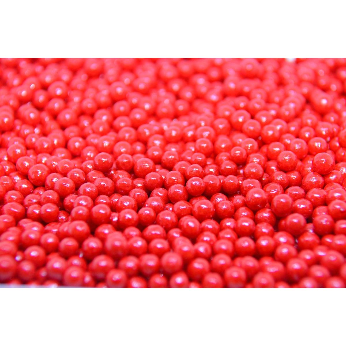 красное драже. красный шоколадные драже. красное драже. красное драже производители. мелкие красные драже.