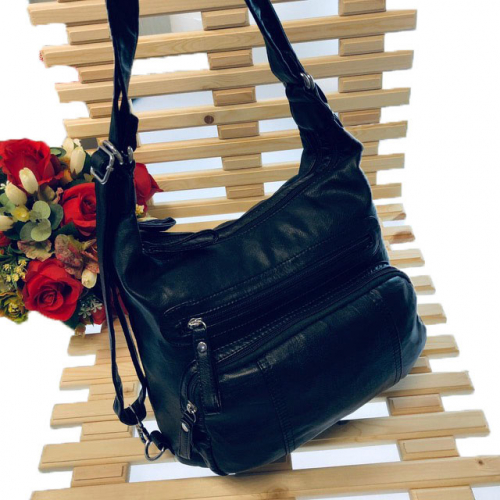 Cумка-рюкзак оверсайз Atea формата А4 из матовой мягкой эко-кожи чёрного  цвета.