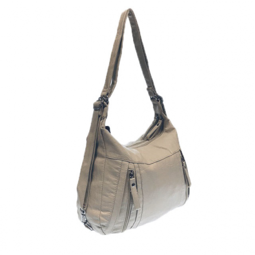 Функциональная сумка-рюкзак Suare формата А4 из матовой мягкой эко-кожи бежевого цвета.