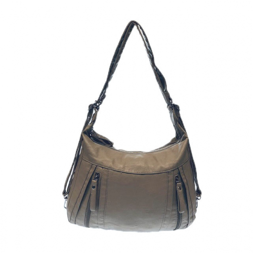 Функциональная сумка-рюкзак Suare формата А4 из матовой мягкой эко-кожи цвета латте.