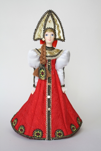 Кукла сувенирная фарфоровая. Девушка в традиционном праздничном костюме. К.19 -н. 20 в. Россия.