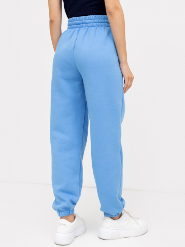 Теплые свободные брюки-джоггеры синего цвета с изображением улитки