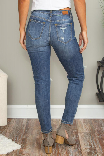 Синие винтажные облегающие джинсы с дырками на коленях