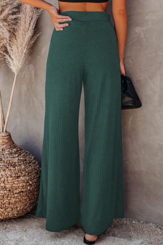 Зеленые трикотажные штаны клеш в рубчик с высокой талией