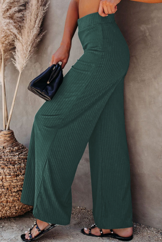 Зеленые трикотажные штаны клеш в рубчик с высокой талией