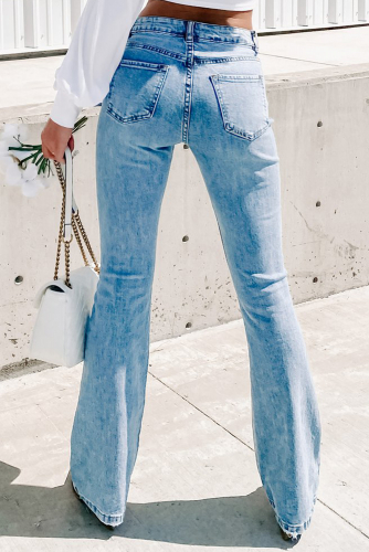 Голубые винтажные потертые джинсы-клеш