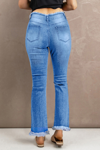 Голубые потертые рваные расклешенные джинсы с высокой посадкой