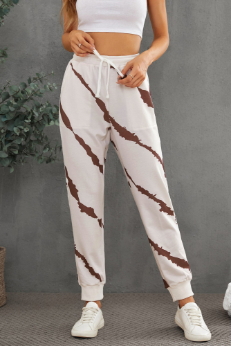 Белые штаны с эластичной талией на шнуровке и коричневыми диагональными полосами