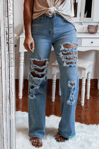 Голубые рваные расклешенные джинсы с высокой талией