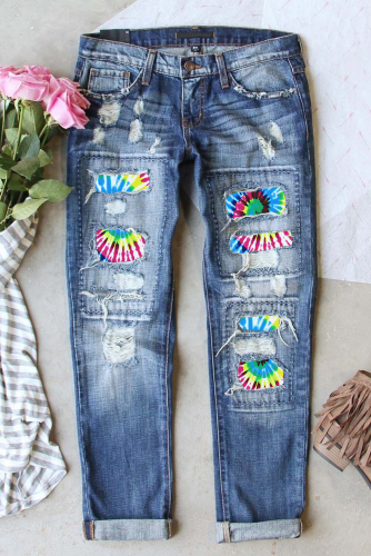 Голубые джинсы с высокой талией и заплатками с разноцветным красочным принтом