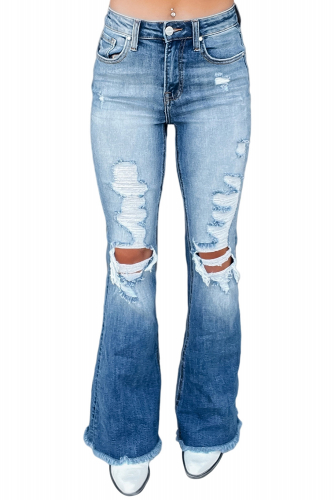 Голубые потертые джинсы-клеш с дырками на коленях и высокой талией