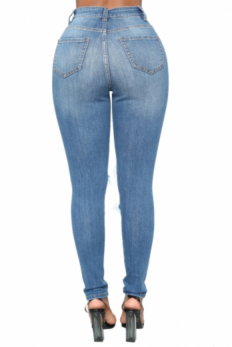 Голубые джинсы-скинни с потертостями и разрезами