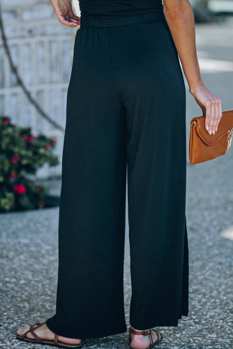 Черные широкие брюки со средней посадкой и разрезами по бокам