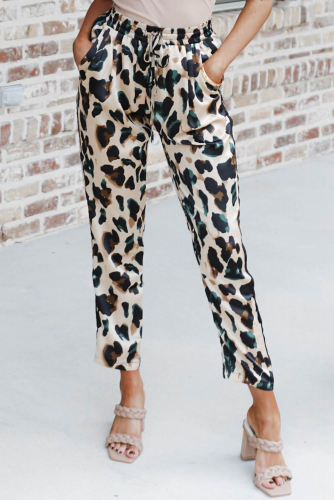 Бежевые укороченные штаны с эластичной талией и разноцветным леопардовым принтом