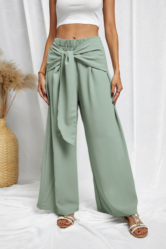 Зеленые широкие брюки с узлом на талии