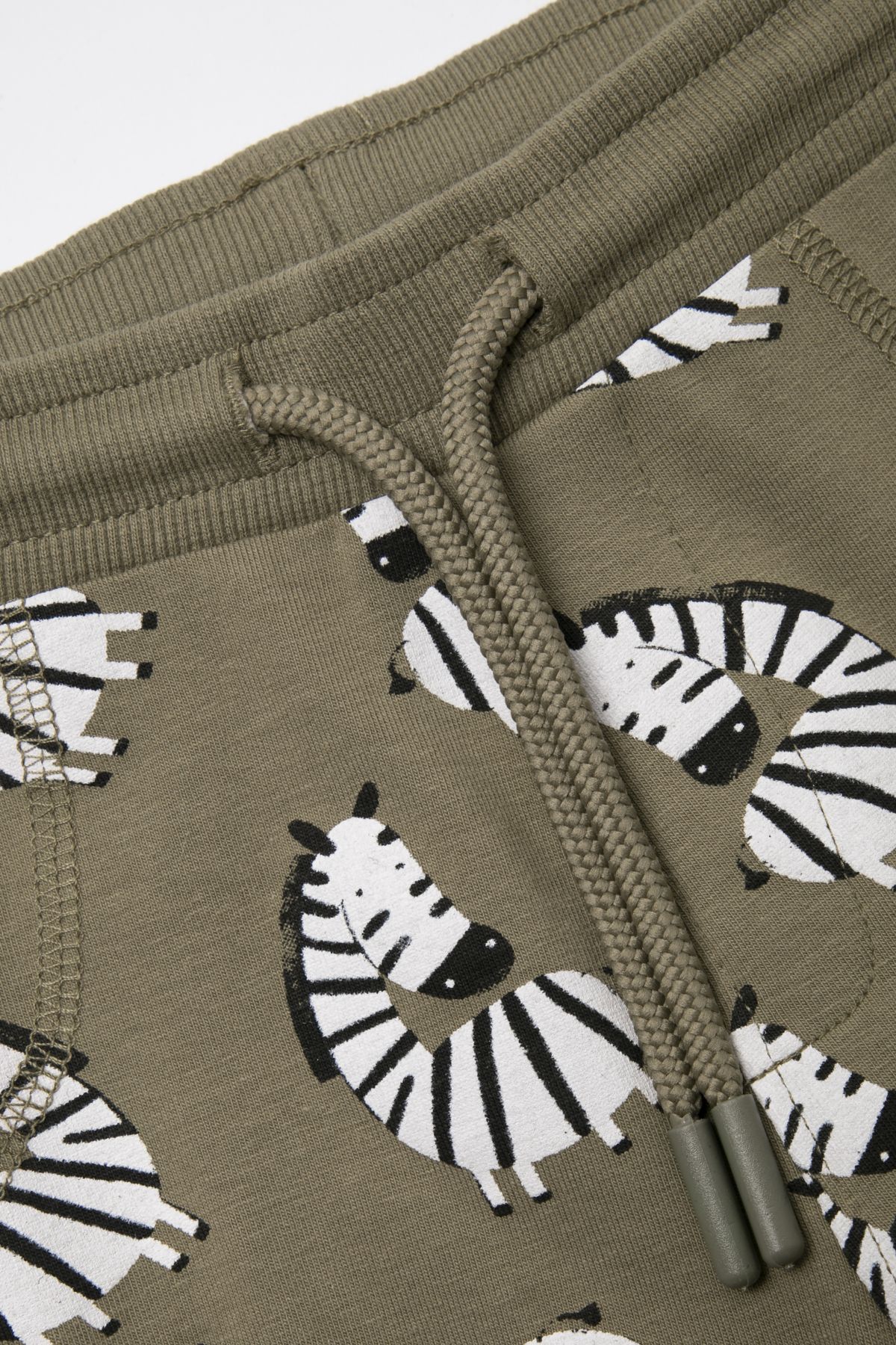 -39% Legginsy z długą nogawką khaki w żyrafy