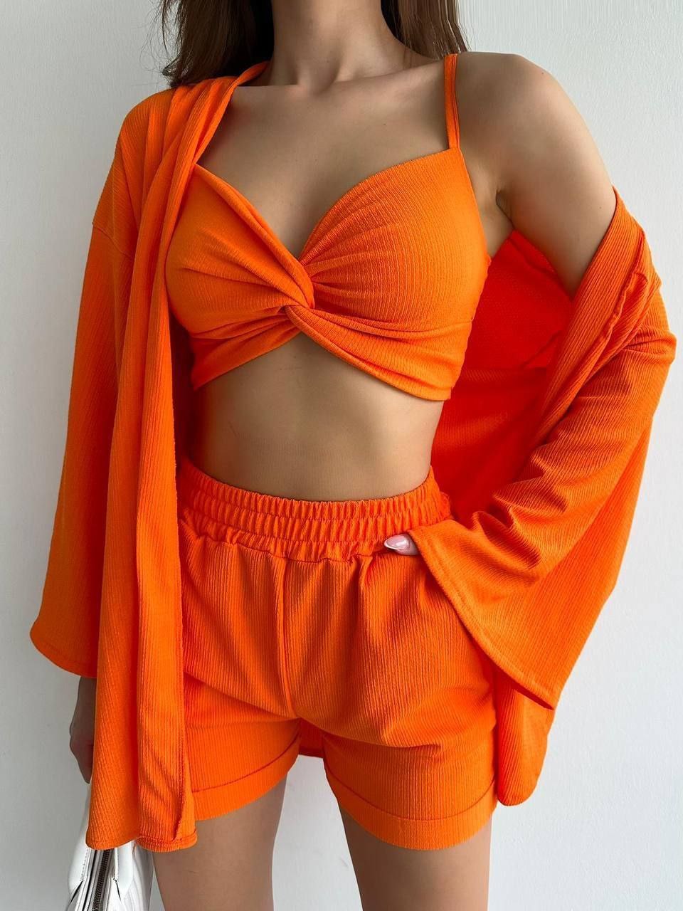 Оранжевый костюм Эды