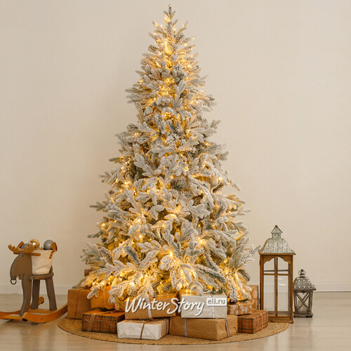 Искусственная елка с лампочками Россо Премиум заснеженная 240 см, 1240 теплых белых ламп, ЛИТАЯ + ПВХ (GREEN TREES)