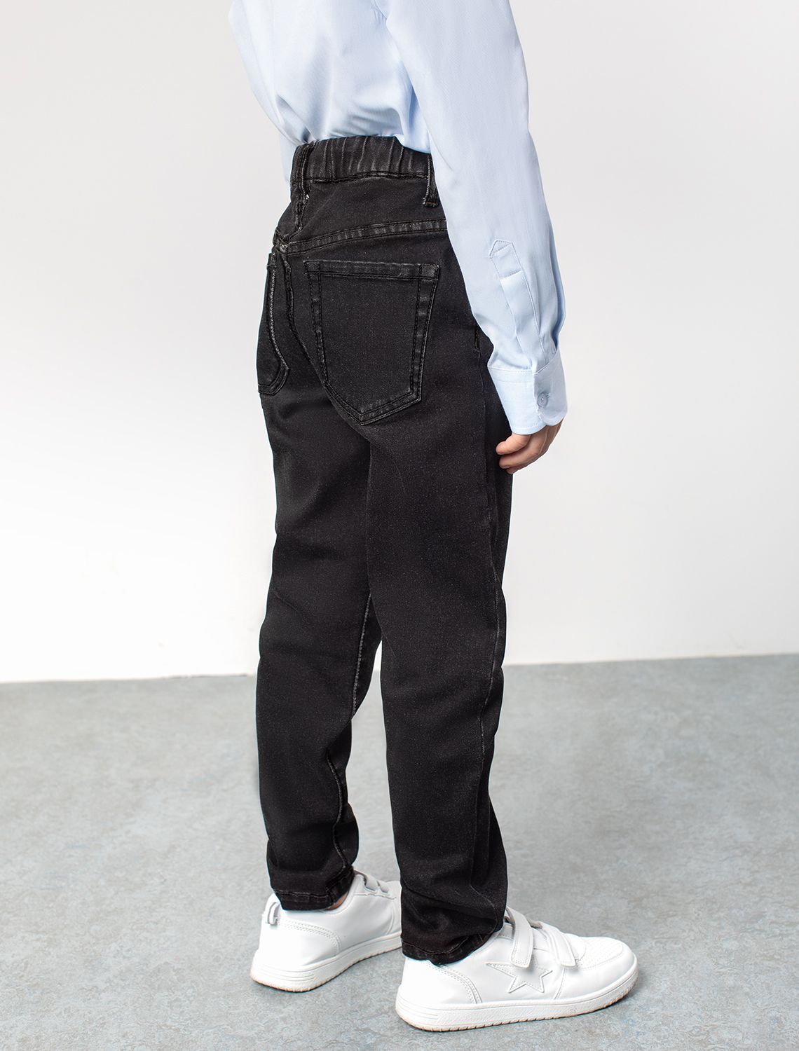 Ст.цена 2090р Эластичные джинсы с поясом на резинке M54.073 черный