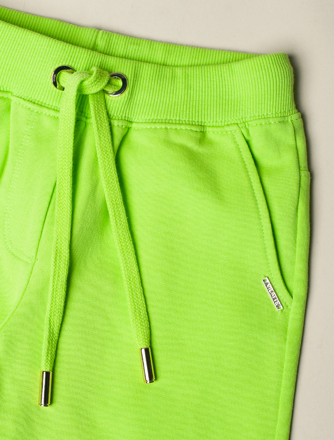 Ст.цена 1490р Брюки из премиального футера с золотистой фурнитурой F44.060 неон