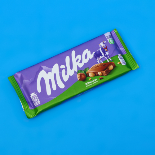 Шоколадная плитка Milka, с цельным фундуком, 100 г