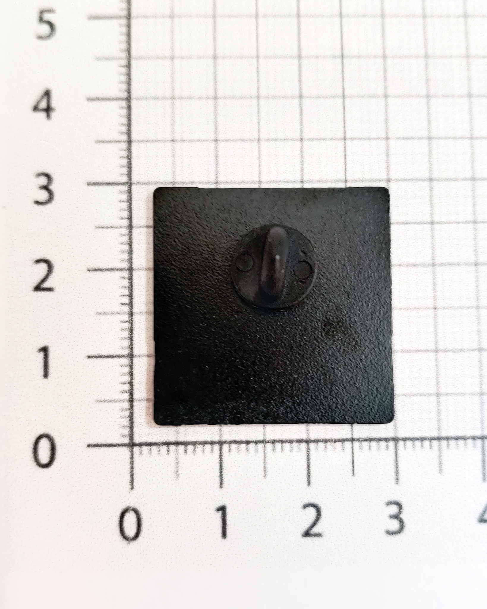 Металлический значок