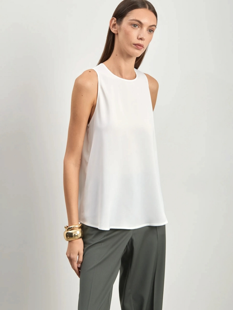 Однотонный топ ,
80% полиэстер, 20% вискоза ,