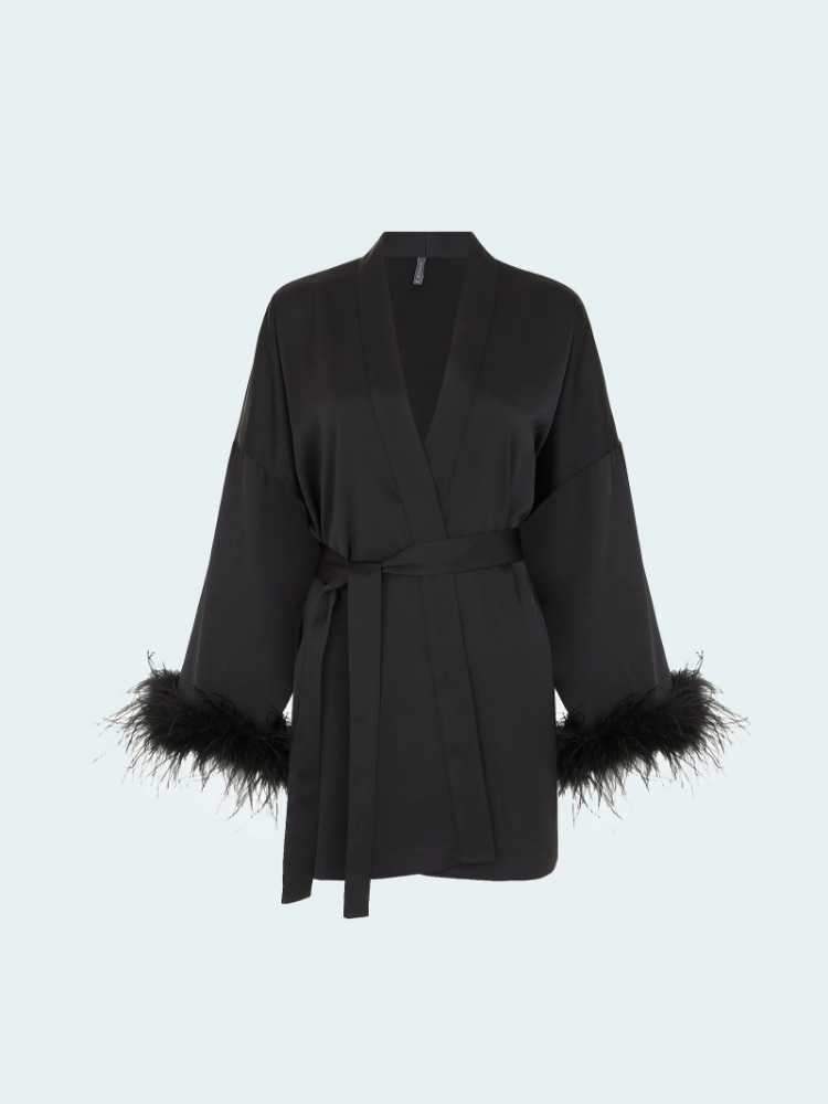 Блузка-кимоно с перьями ,
80% полиэстер, 20% вискоза ,