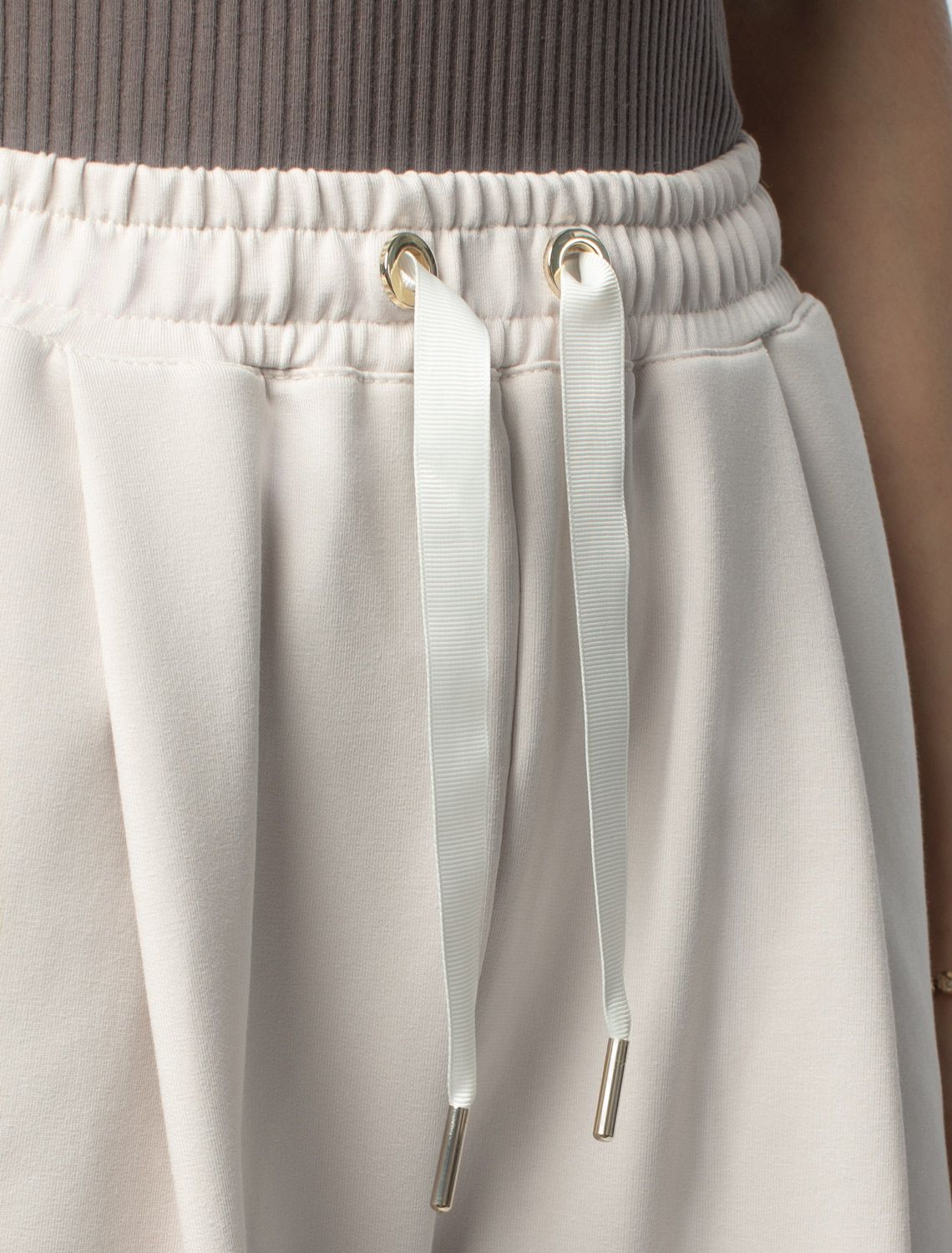 Свободные брюки из тонкого премиального футера с эластаном D44.140 бежевый