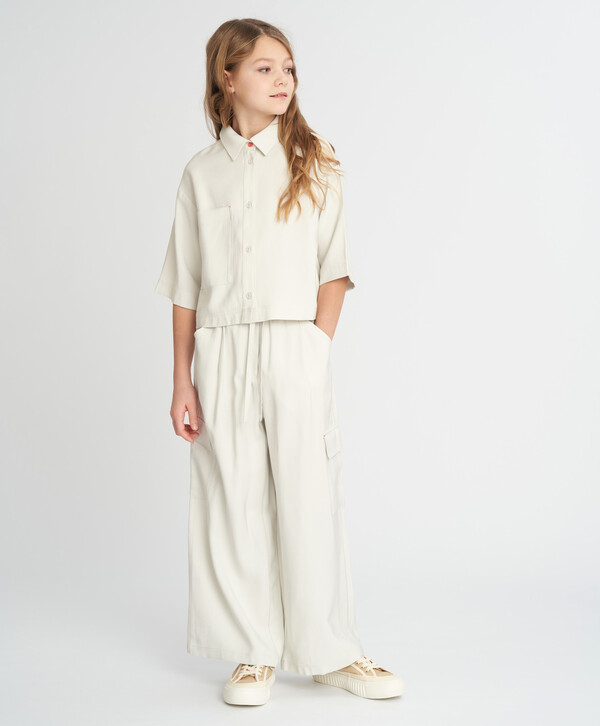 1960 р.  2800 р.  Брюки палаццо для девочки серые с карманами Button Blue