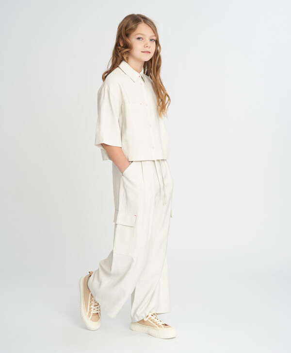 1960 р.  2800 р.  Брюки палаццо для девочки серые с карманами Button Blue