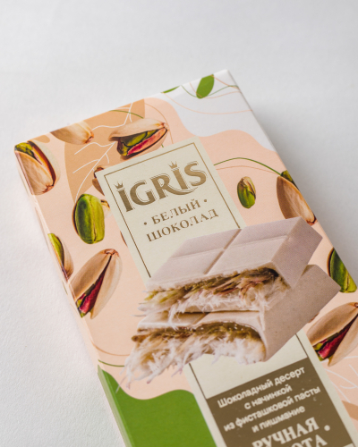 Шоколад белый IGRIS с начинкой из фисташковой пасты и пишмание, 150г