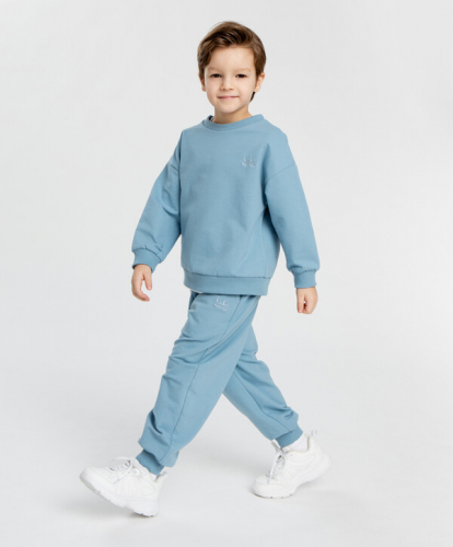 912 р.  1139 р.  Джоггеры трикотажные с завязками голубые детские Button Blue