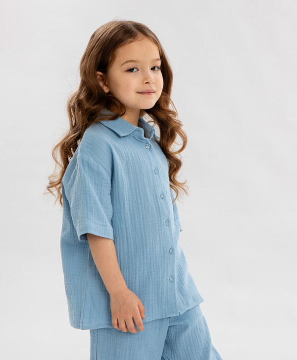 920 р. 1150 р. Рубашка с коротким рукавом голубая для девочки Button Blue