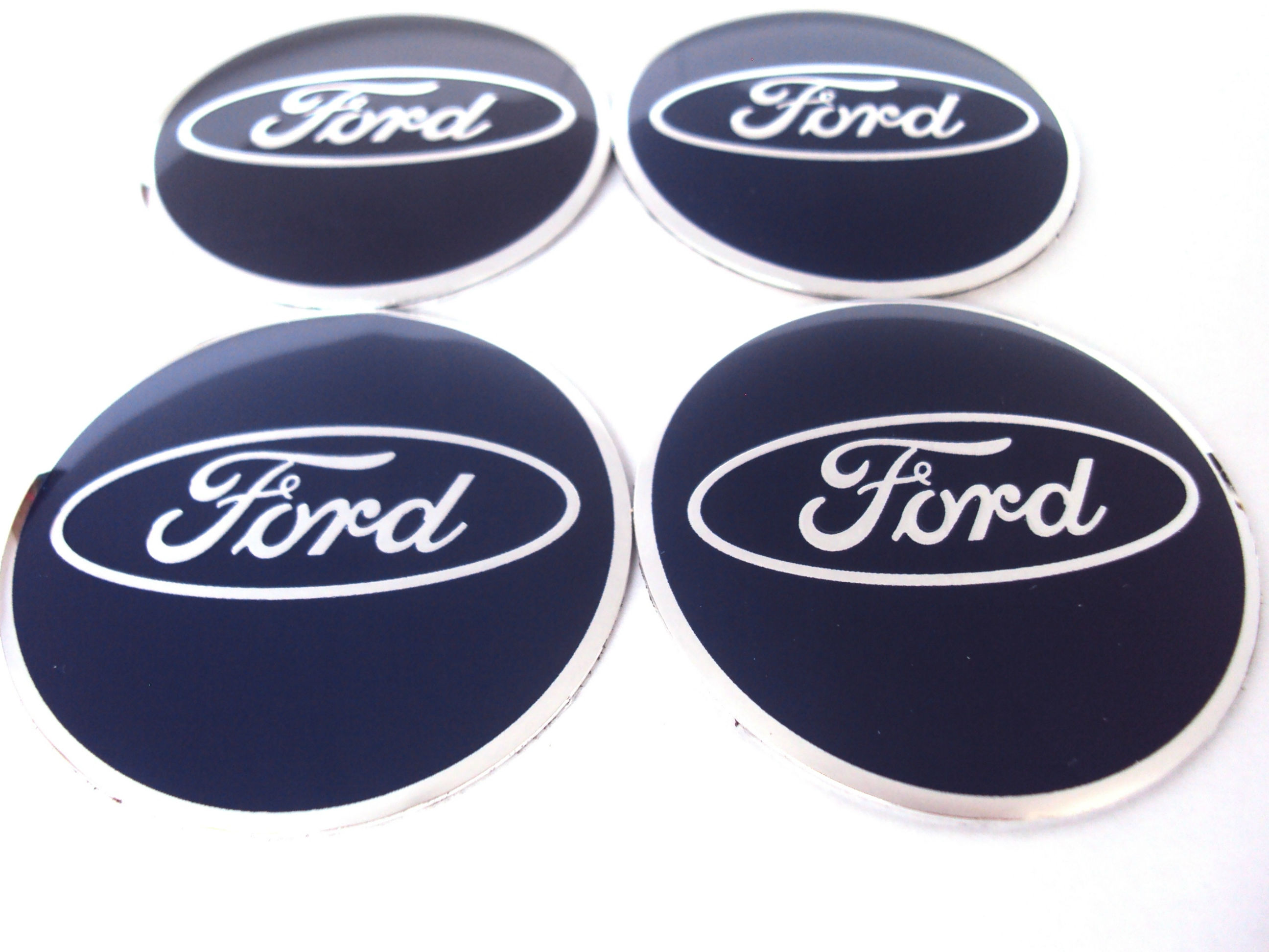 Купить логотип на диски. Наклейки Ford 80 мм на колпачки литых дисков. Наклейки на колпачки дисков Форд 60 мм синий. Наклейки Форд на колеса колесные диски колёса наклейка колпак Ford d-60mm. Наклейки на колпачки литых дисков 56 мм Форд Мондео.