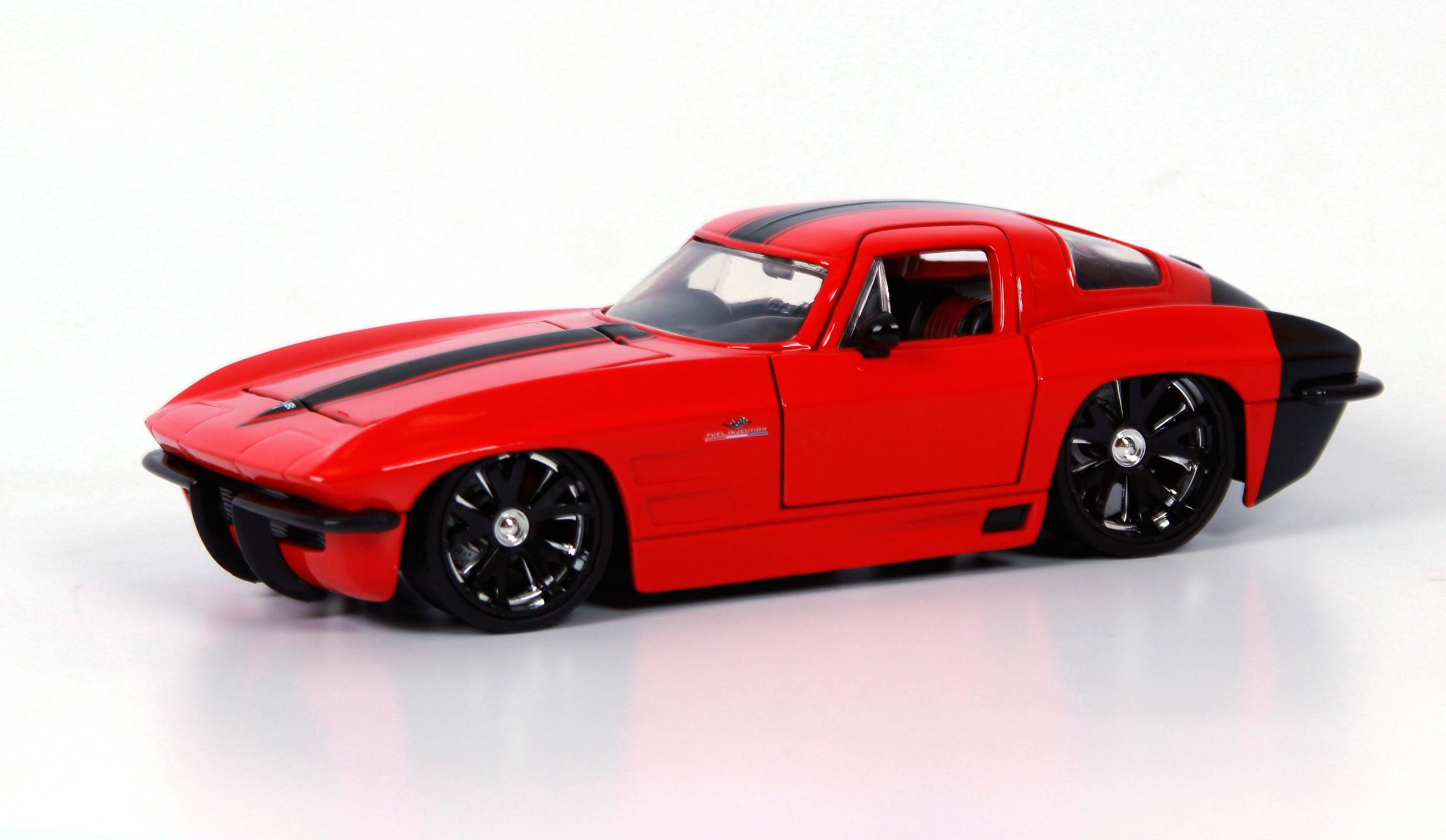 Масштаб 1 24. Модель машинка Камаро z 28. Chevy Corvette Jada. 1 24 Масштаб модели. Chevy Camaro 1973 Jada 1 32.