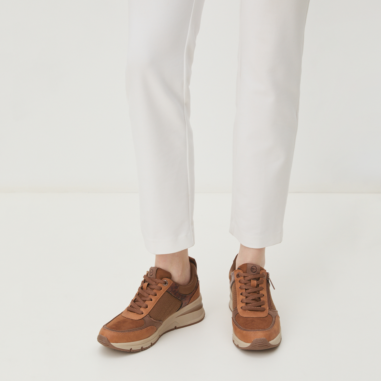 6270 р. 11000 р. Женские кроссовки на танкетке TAMARIS REA