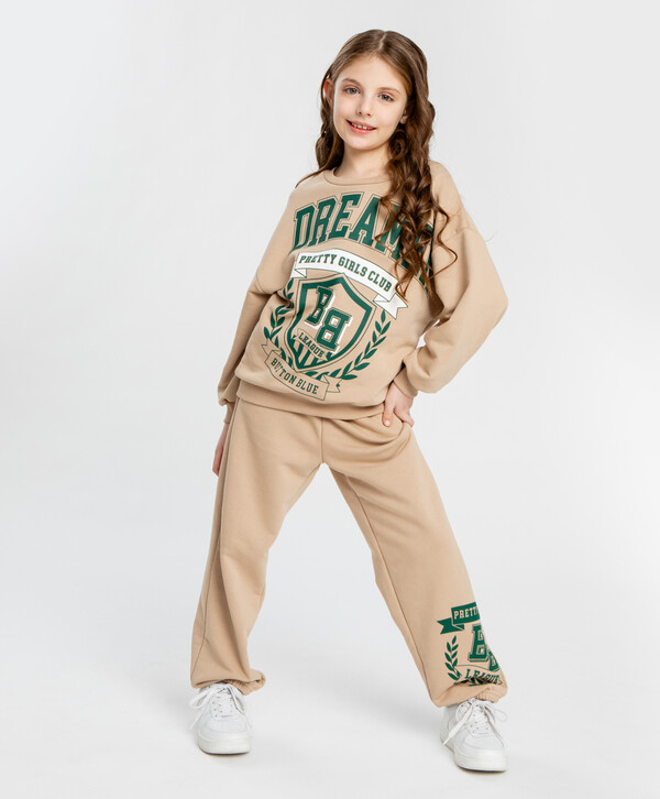 1600 р.  2000 р.  Джоггеры с принтом бежевые для девочки Button Blue