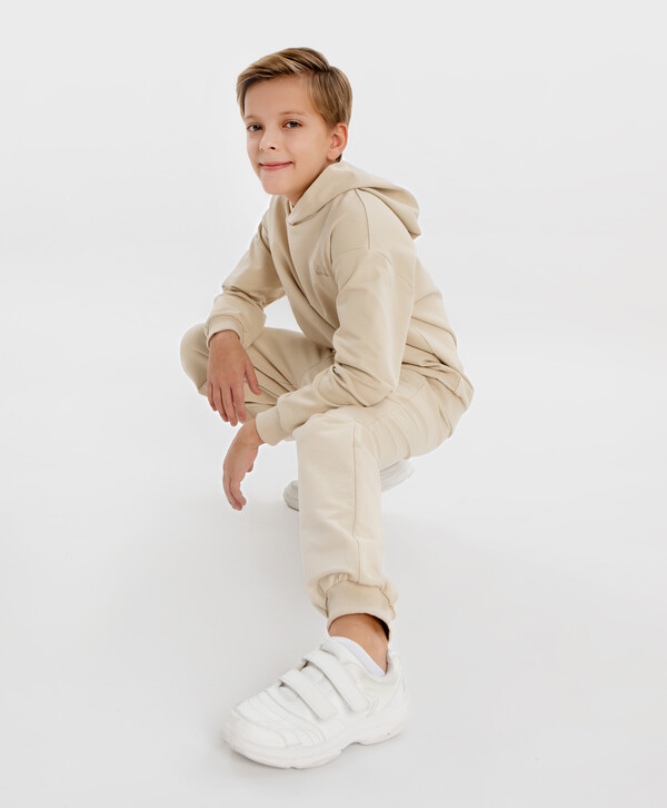 912 р.  1139 р.  Джоггеры базовые бежевые детские Button Blue