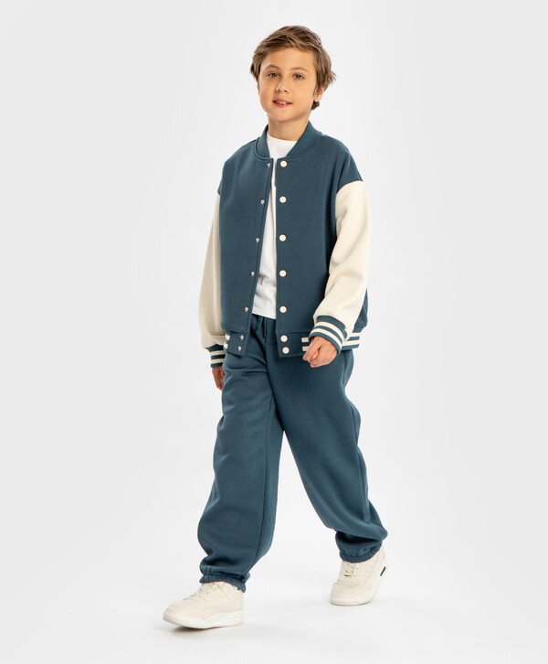 1050 р. 1500 р. Джоггеры с поясом на резинке темно-голубые детские Button Blue