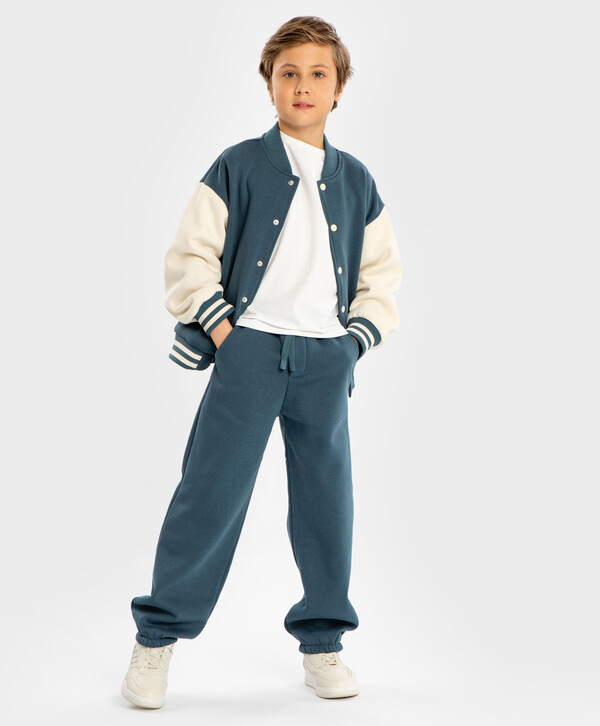 1050 р. 1500 р. Джоггеры с поясом на резинке темно-голубые детские Button Blue